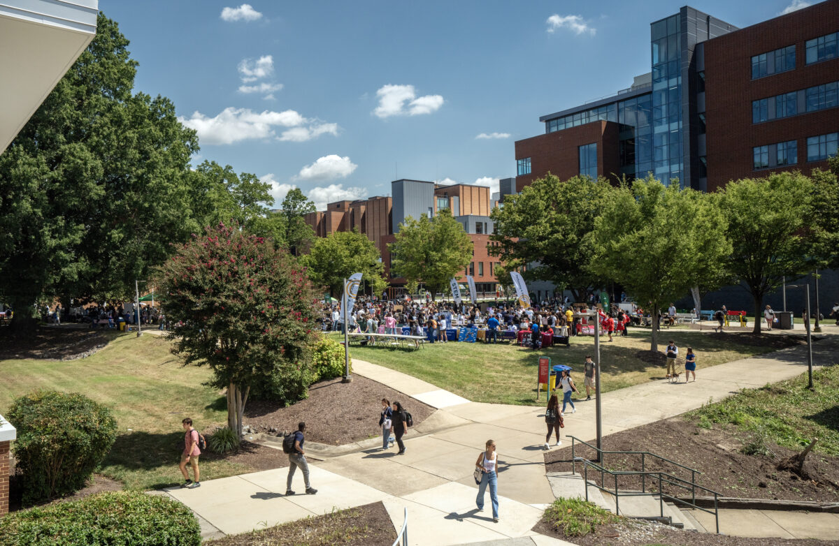 Students walking across the Fairfax campus of George Mason University