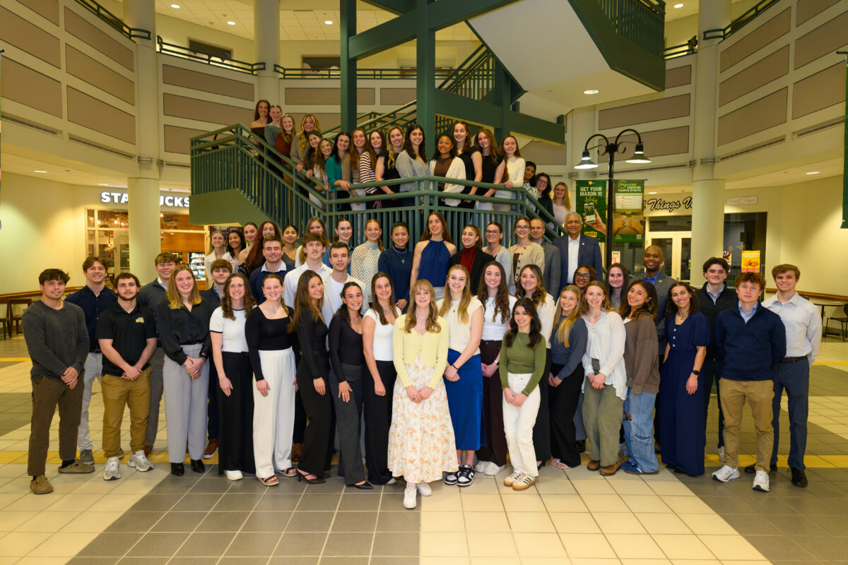 Group of Provost Scholar Athlete students on stairwell